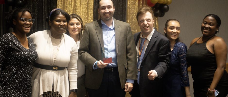 Dr. Nick Hirshon accepts the Students First Award on April 25, 2023, at William Paterson University. The Student Government Association describes this as "the highest honor SGA bestows on a William Paterson employee who is consistently dedicated to the success of William Paterson students." Pictured left to right are 2022-2023 WPSPJ president Angelica Amegashie, graduate student liaison Beatrice Amune, member Diana Kochaha, Dr. Hirshon, secretary Andrew Herbst, vice president Rochelle Estrada, and treasurer Angela Amegashie.